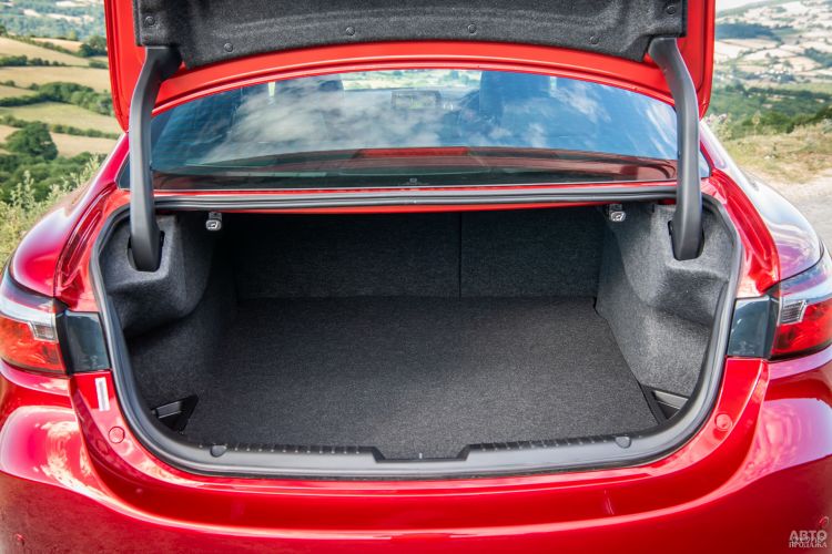 Объем багажника Mazda – 480 л