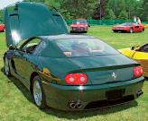Зеленый Ferrari 456 GT с малиновым кожаным салоном