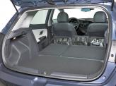 Сложив задние сиденья, можно увеличить объем багажника с 380 до 1318 л